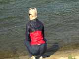 Watch Chloe enjoying her shiny nylon Rainwear at the River 9