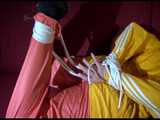 Watch 2 Videos with Lucy tied and gagged in shiny nylon Rainwear and a Windbreaker from our archives 2013 10
