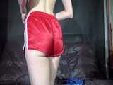 Watch Sonja changing and trieing some of her shiny nylon Shorts  5