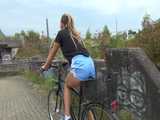 Watch Sandra riding her bike enjoying her shiny nylon shorts 10