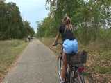 Watch Sandra riding her bike enjoying her shiny nylon shorts 7