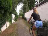 Watch Sandra riding her bike enjoying her shiny nylon shorts 8
