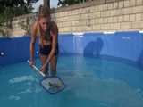 Get a Video with Sandra cleaning the Pool in her shiny nylon Shorts 6