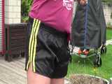 Watch Pia having fun outdoors with her shiny nylon Shorts 7